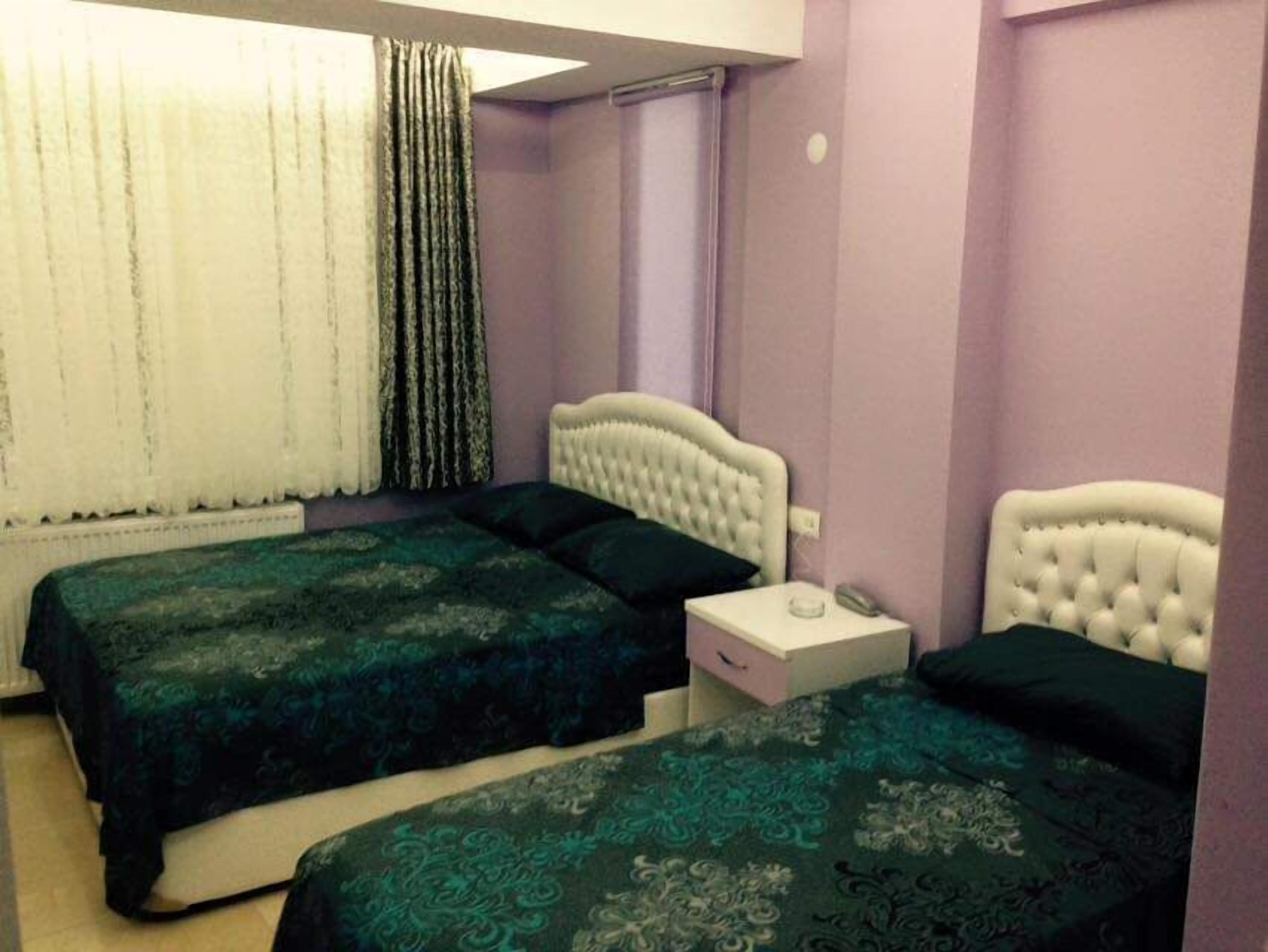 Quadruple Room, City View | Desk, laptop workspace, iron/ironing board, free WiFi