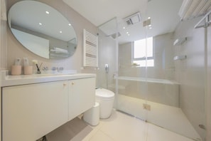 Shower, hair dryer, towels, soap