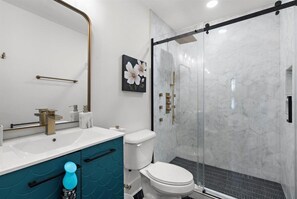 Shower, hair dryer, towels, soap