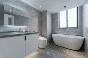Shower, hair dryer, towels, soap