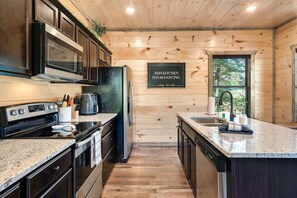 Fridge, microwave, oven, stovetop - Modern Cabin w/ Pool, Hot Tub, Games & More! (Sevierville)
