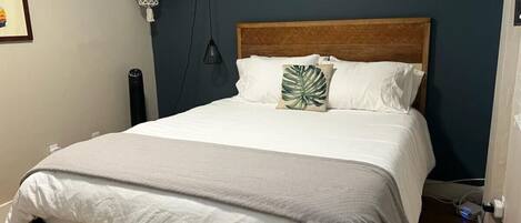 1 bedroom, desk, iron/ironing board, travel crib