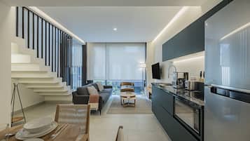 Loft, 1 Bedroom | Living room | 55-inch Smart TV with digital channels