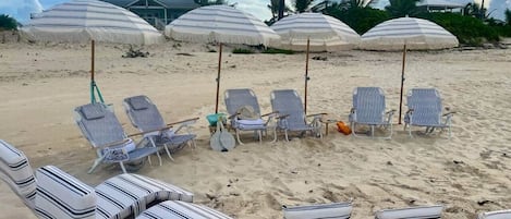 On the beach, sun-loungers, beach towels