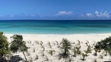 On the beach, sun-loungers, beach towels