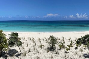 On the beach, sun-loungers, beach towels