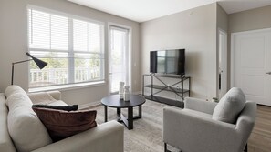 Apartment, 2 Bedrooms | Living area | 40-inch TV with digital channels - Landing Dry Creek Apartments (Huntsville)
