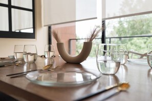 Deluxe Apartment, 3 Bedrooms, Balcony | Living area | 60-inch Smart TV with digital channels, Netflix, Hulu
