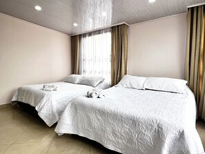 4 bedrooms, iron/ironing board, travel cot, WiFi