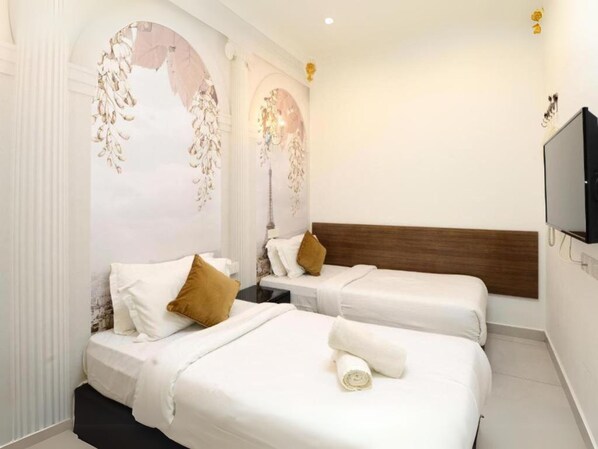 Kahden hengen huone (kaksi sänkyä) | Työpöytä, silitysrauta/-lauta, ilmainen Wi-Fi