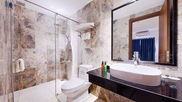 Hair dryer, slippers, towels, soap