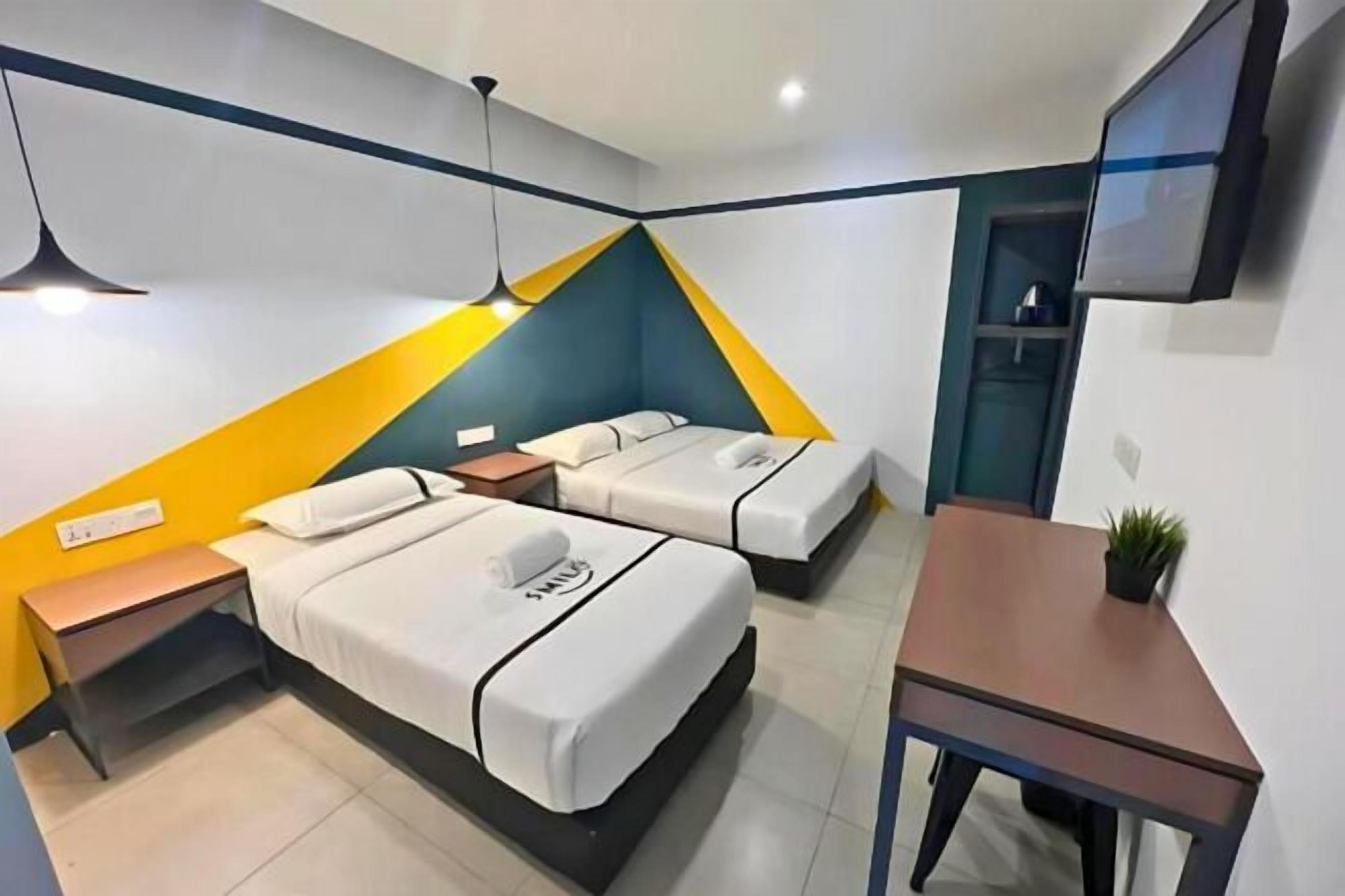 Coffres-forts dans les chambres, bureau, fer et planche à repasser