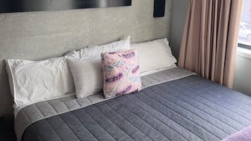 1 dormitorio, tabla de planchar con plancha, wifi gratis y ropa de cama