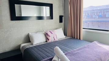 1 dormitorio, tabla de planchar con plancha, wifi gratis y ropa de cama