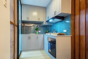 Suite estudio | Cocina básica privada | Frigorífico pequeño