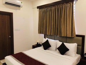 Standard Room | Premium bedding, soundproofing, free WiFi, bed sheets - COASTAL GRANDCassa Times Electronic City (Bengaluru)