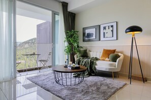 Appartement Deluxe, 3 chambres, non-fumeur, vue colline | Coin séjour