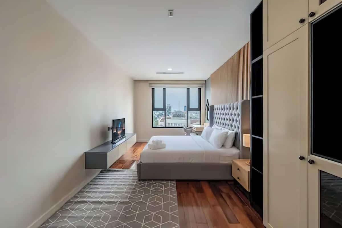 Luxury Apartment, 2 Bedrooms, City View, Garden Area | 1 bedroom, desk, laptop workspace, soundproofing