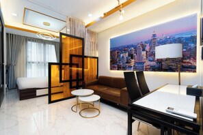 Superior Studio, 1 Queen Bed, Kitchen, City View | Living area | 35-inch Smart TV with cable channels - Salute de Madison Luxury Apt District 1 (Ho Chi Minh City)
