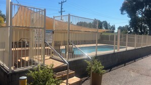 A fenced pool area with a sign indicating it is for park use only. - Gunnedah Tourist Caravan Park (Gunnedah)