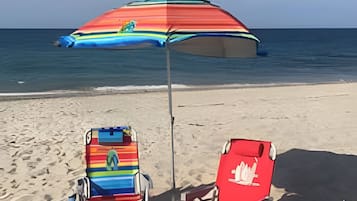 Sun loungers, beach umbrellas, beach towels