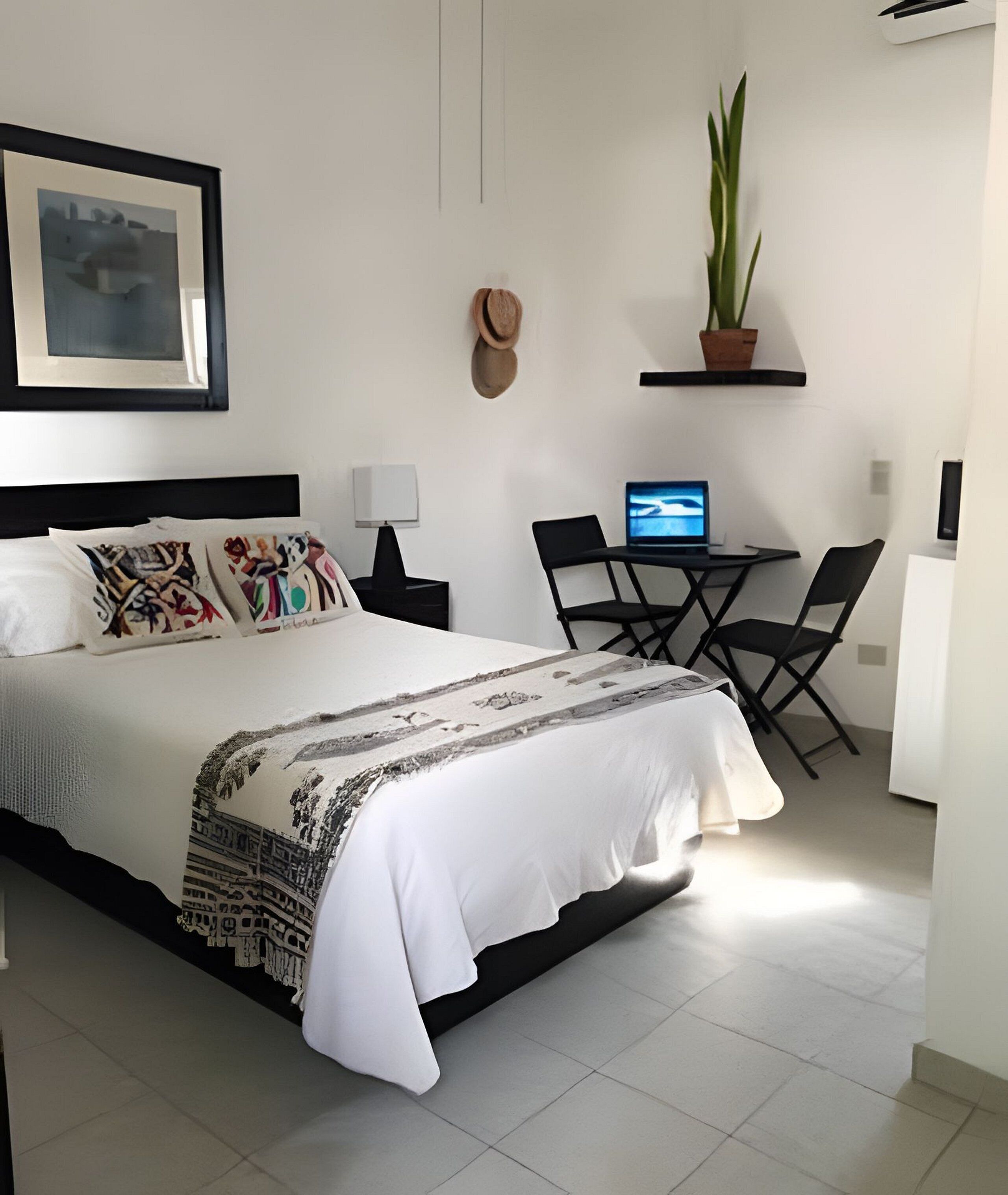 Standard Studio | Individually decorated, individually furnished, desk, laptop workspace