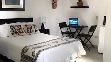 Standard Studio | Individually decorated, individually furnished, desk, laptop workspace