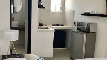 Standard Studio | Individually decorated, individually furnished, desk, laptop workspace