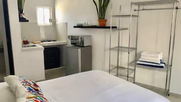 Standard Studio | Individually decorated, individually furnished, desk, laptop workspace