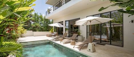 Outdoor pool, pool umbrellas, pool loungers