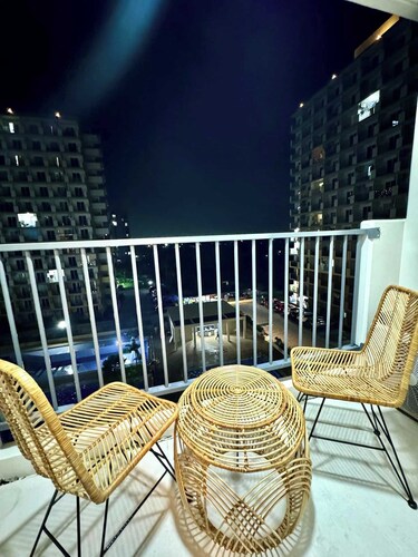 Studio Condo Unit with Balcony Facing Pool near Mactan Airport