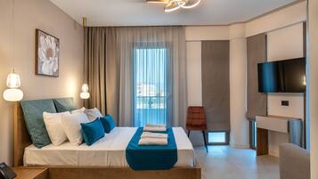 Junior Studio Suite, Balcony, Partial Sea View | 1 bedroom, minibar, in-room safe, blackout curtains