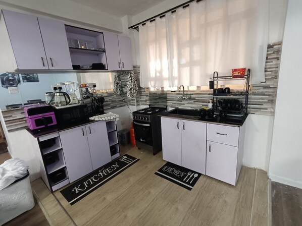 Fridge, microwave, stovetop, highchair