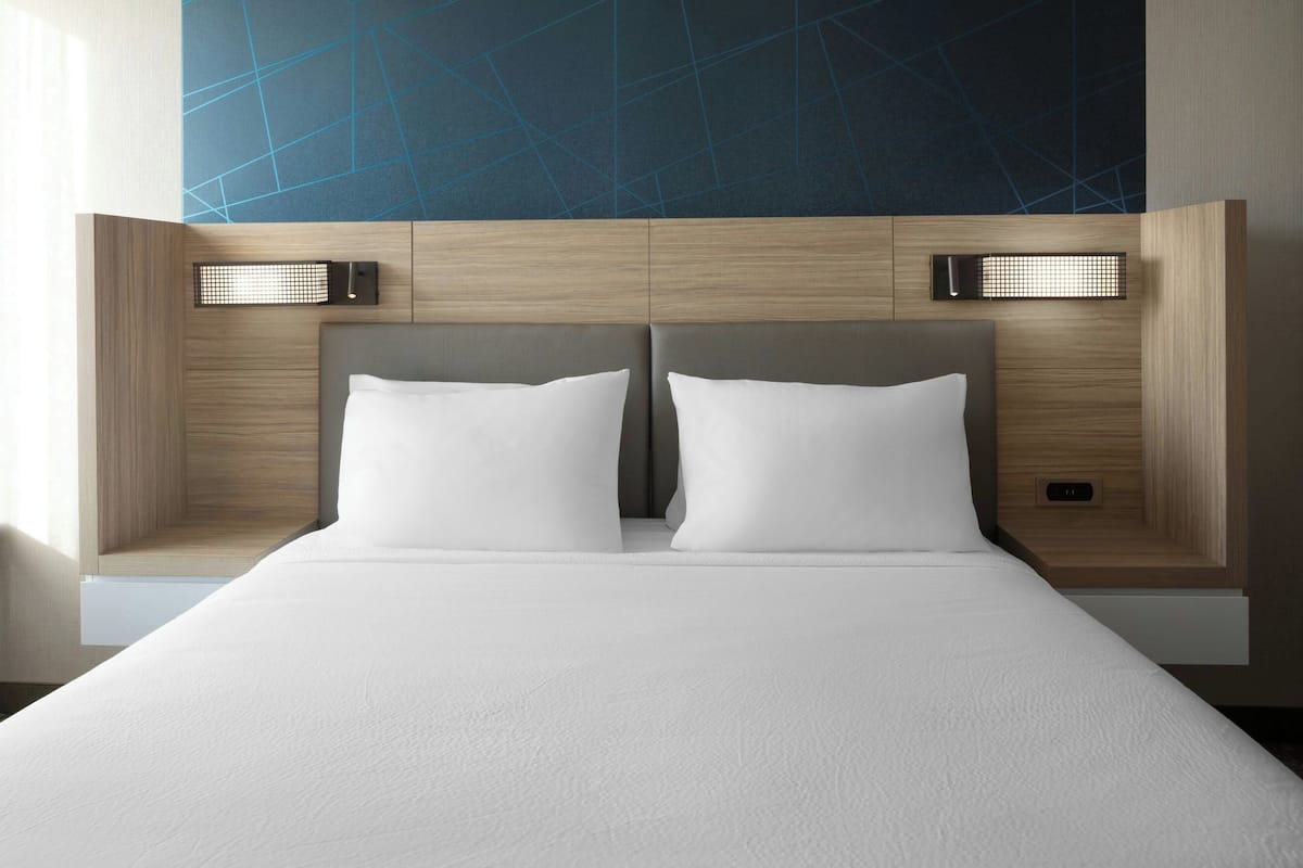 Blackout drapes, iron/ironing board, free WiFi, bed sheets