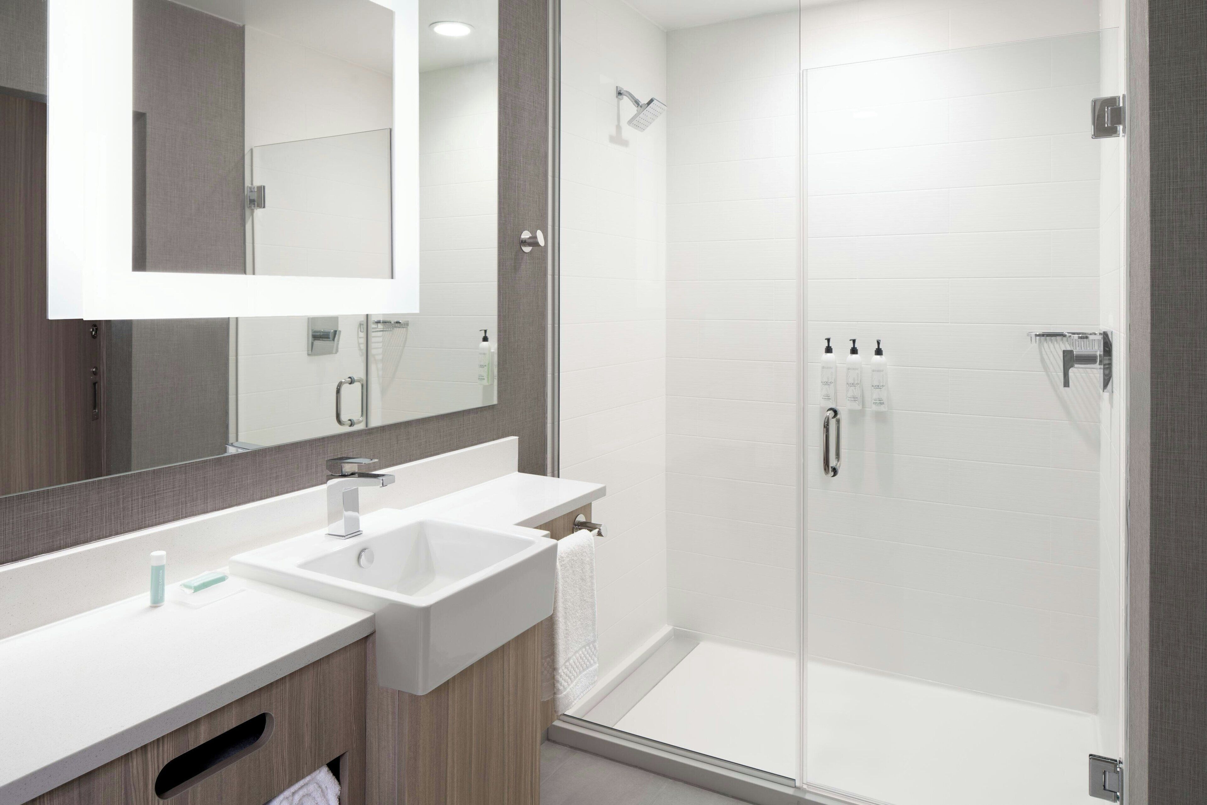 Rainfall showerhead, free toiletries, hair dryer, towels