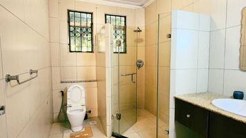 Luxury Apartment, Balcony, City View | Bathroom | Shower, slippers, towels, soap