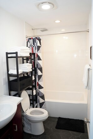 Hair dryer, towels, soap, toilet paper