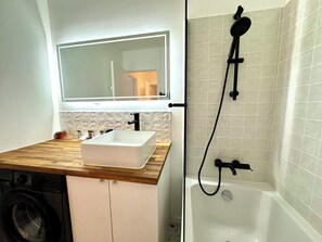 Hair dryer, towels, soap, toilet paper