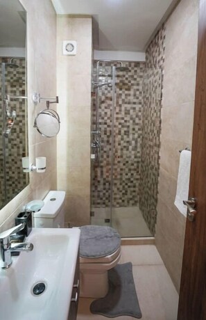 Hair dryer, towels, soap, shampoo