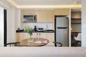 Fridge, microwave, stovetop, coffee/tea maker