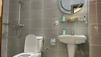 Shower, free toiletries, towels, soap