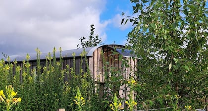 Charming 1-bedroom cabin in the fields near a small village.