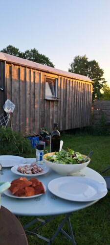 Charming 1-bedroom cabin in the fields near a small village.