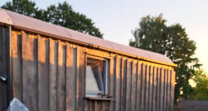 Charming 1-bedroom cabin in the fields near a small village.