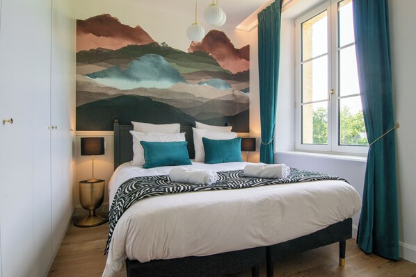 2 slaapkamers, een strijkplank/strijkijzer, gratis wifi, beddengoed