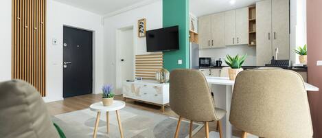 Comfort Apartment, Balcony | Living area | Flat-screen TV