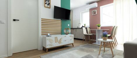 Comfort Apartment, Balcony | Living area | Flat-screen TV