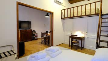 2 dormitorios, escritorio, tabla de planchar con plancha y wifi