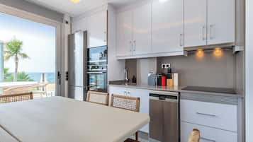 Apartment, 1 Bedroom, Sea View | Private kitchen | Full-size fridge, microwave, oven, stovetop
