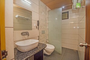 Shower, rainfall showerhead, towels, soap